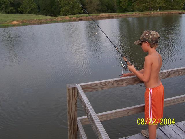 Colin trying to fish with my pole