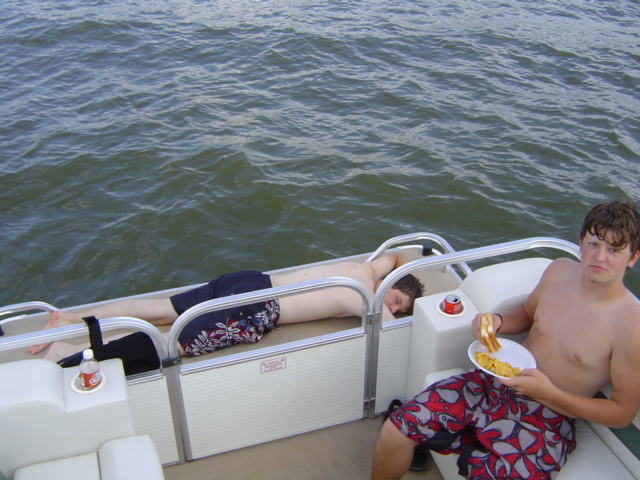 Shelby and Davey hanging out on the pontoon