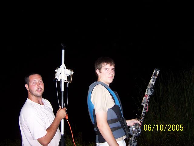 BJ with a light on a stick and Kirk with my bow